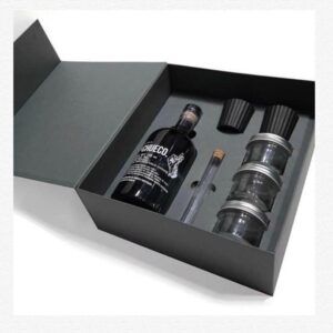 Estuche de lujo personalizado de cartón rígido con inserto para botella y accesorios